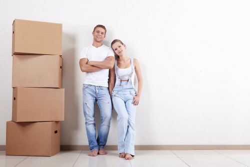 House removalists in Kingston upon Thames loading furniture into a moving van