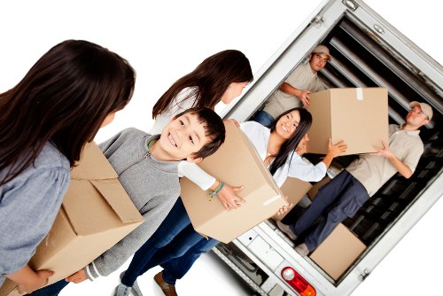 Kingston upon Thames man and van service loading furniture carefully