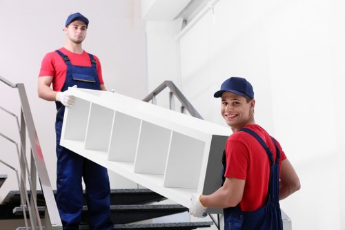 Professional removal team handling boxes during a move in Kingston upon Thames