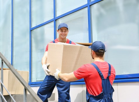 Local movers handling furniture during a flat move in Kingston upon Thames