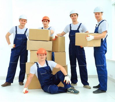 Unpacking boxes in a Kingston upon Thames home after relocation