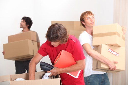 Furniture being loaded into a moving van in Kingston upon Thames