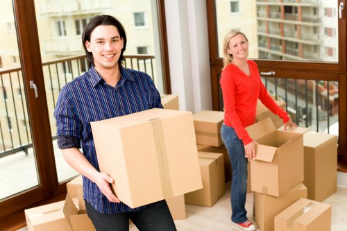 Professional removal van service preparing furniture for transport in Kingston upon Thames