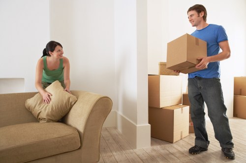 Packed boxes and furniture ready for a local house move