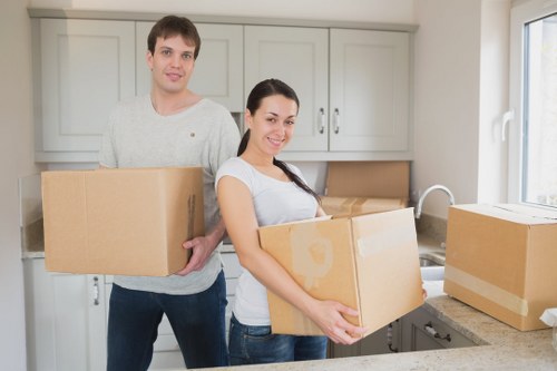 House movers in Kingston upon Thames organizing boxes and furniture for transport